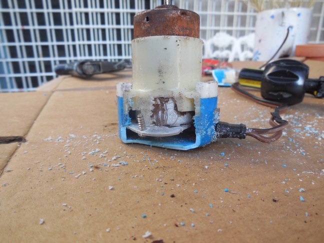 Inside the bilge pump's base